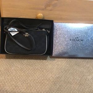 Black small hand bag brand new tags still on